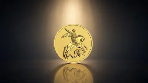 Проверка золотой монеты на подлинность